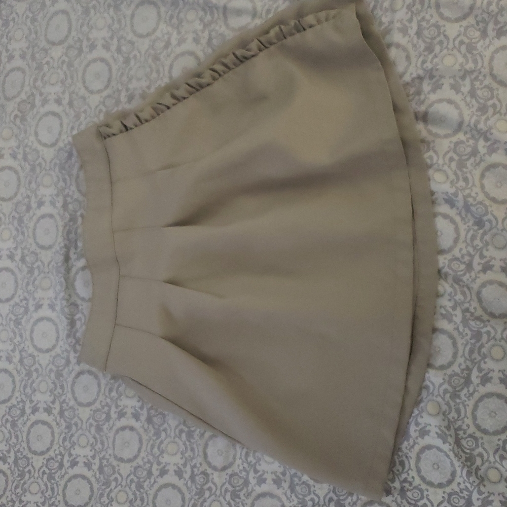 Tan mini skirt